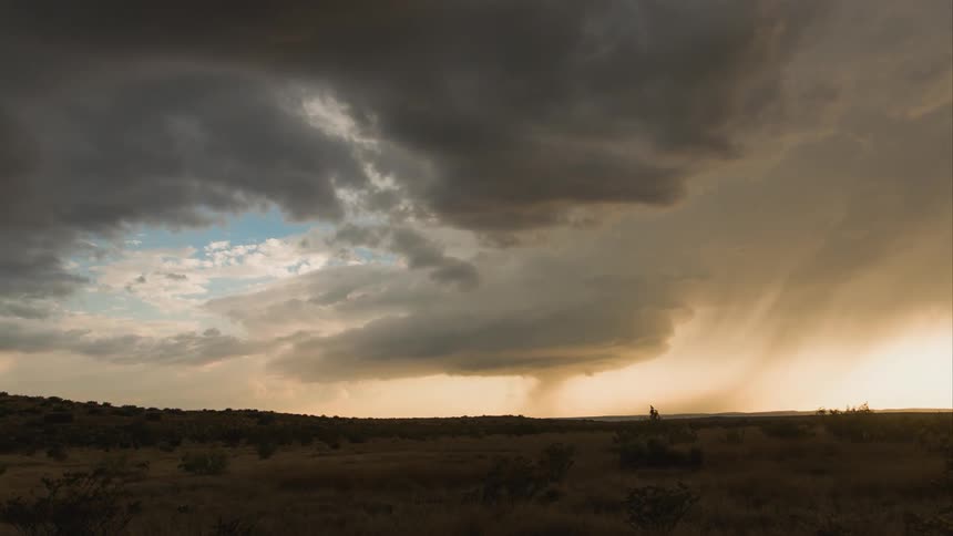 Ominous clouds float over a desert