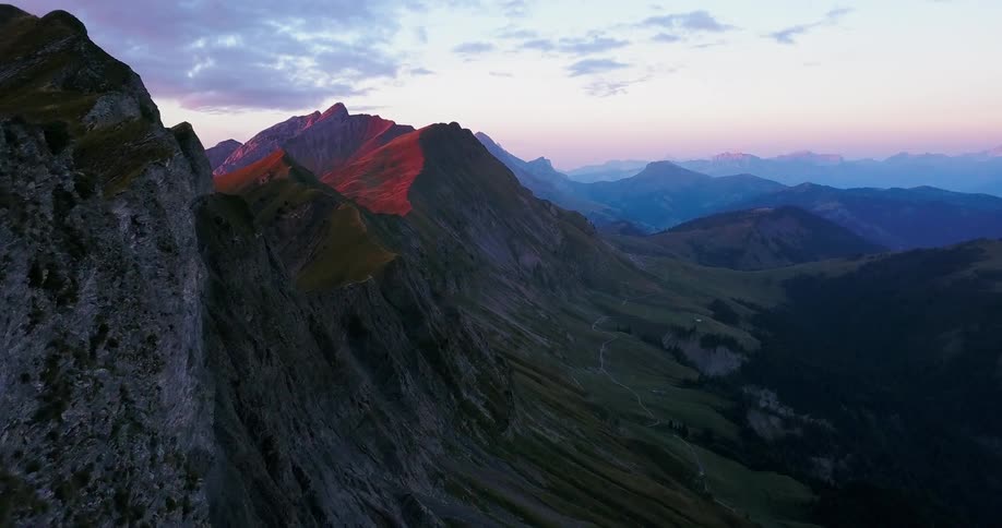Large mountain range at sunset