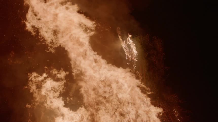 The fire rages at night burning everything ahead