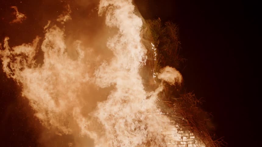 A flame fills the night covering the area