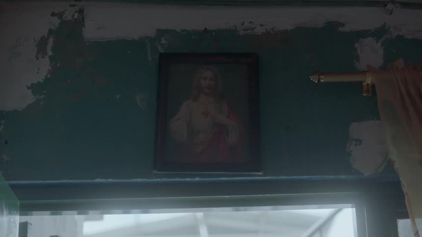 Picture of jesus hangs on a wall