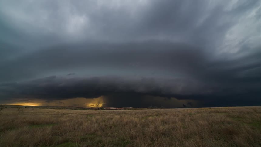 Time lapse of a violent storm moving over a rural area
