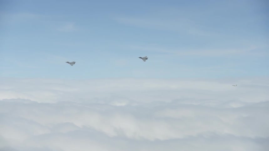 Jets fly above clouds in the sky
