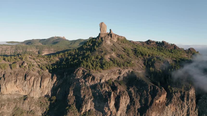 Rock formations stand on a mountain peak