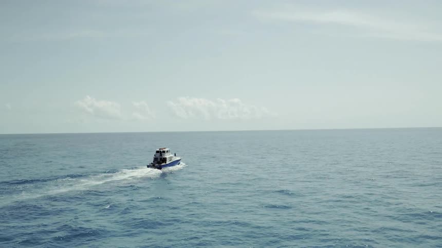Boat cruises on the open water
