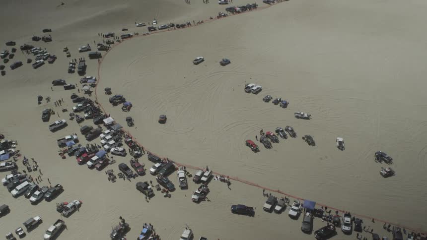A group of cars in the desert
