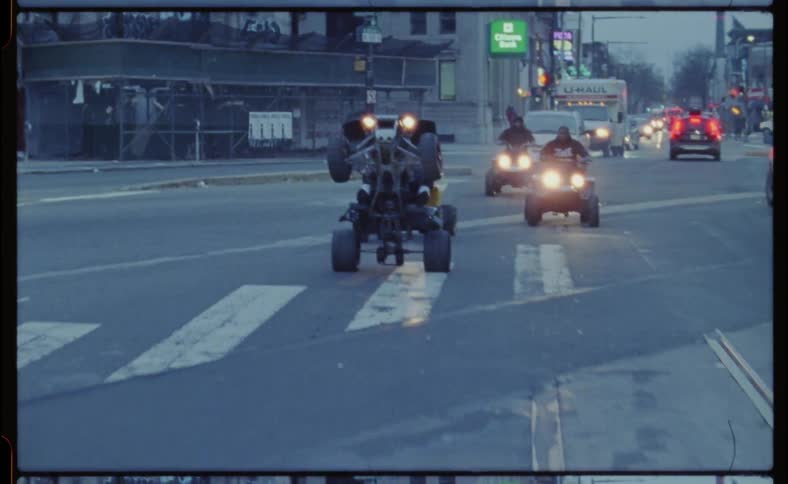 Four wheelers and driven on a city street