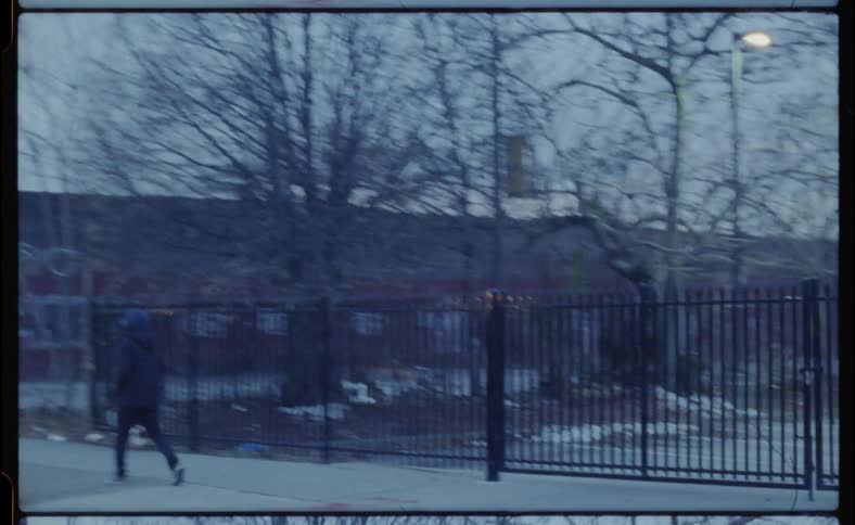 The town is covered with snow on a cloudy day