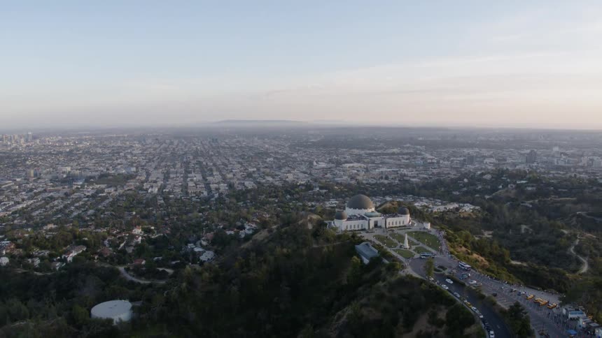 The town is on the green hills below