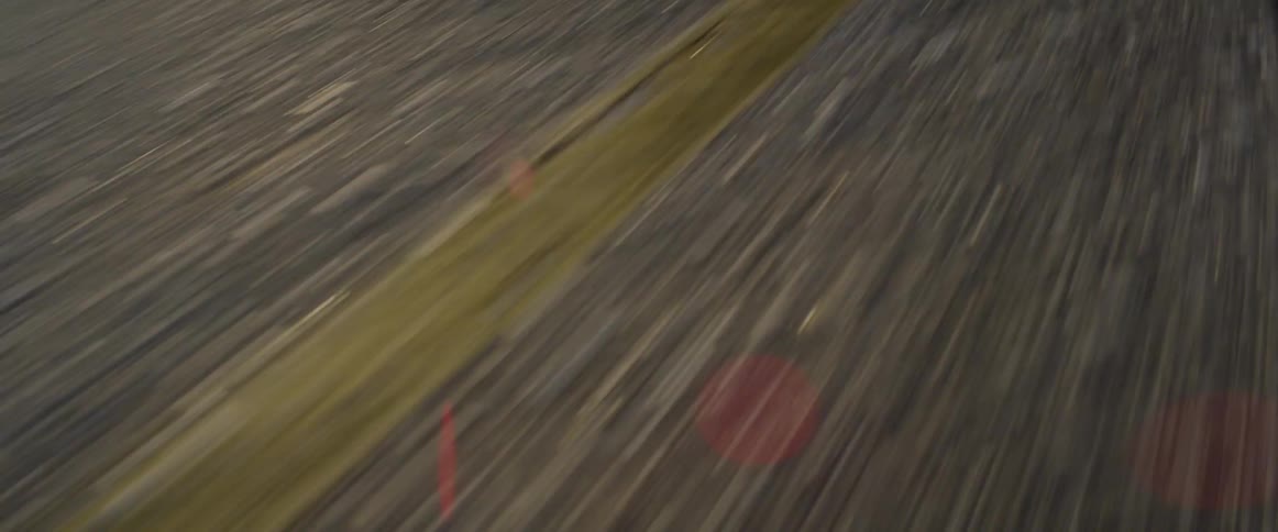 Yellow line running down the pavement