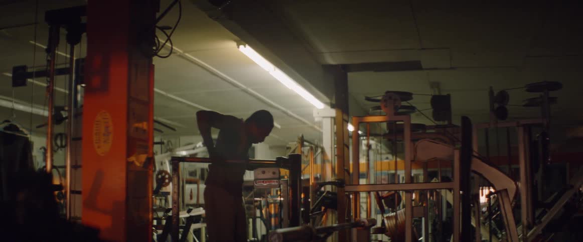 A man works out in a gym