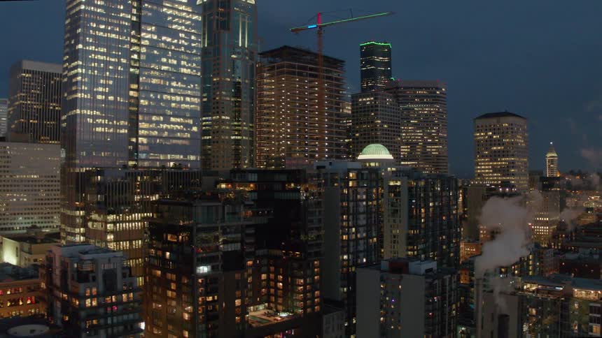 Flying low over the Belltown neighborhood at night