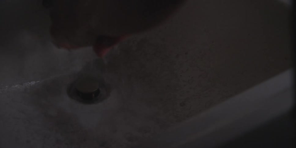 Someone is washing their hands