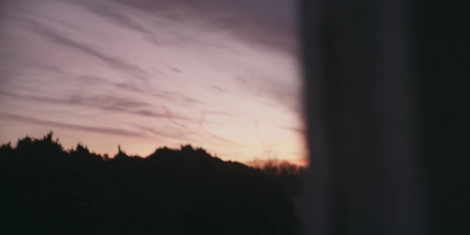 A person walking at dusk