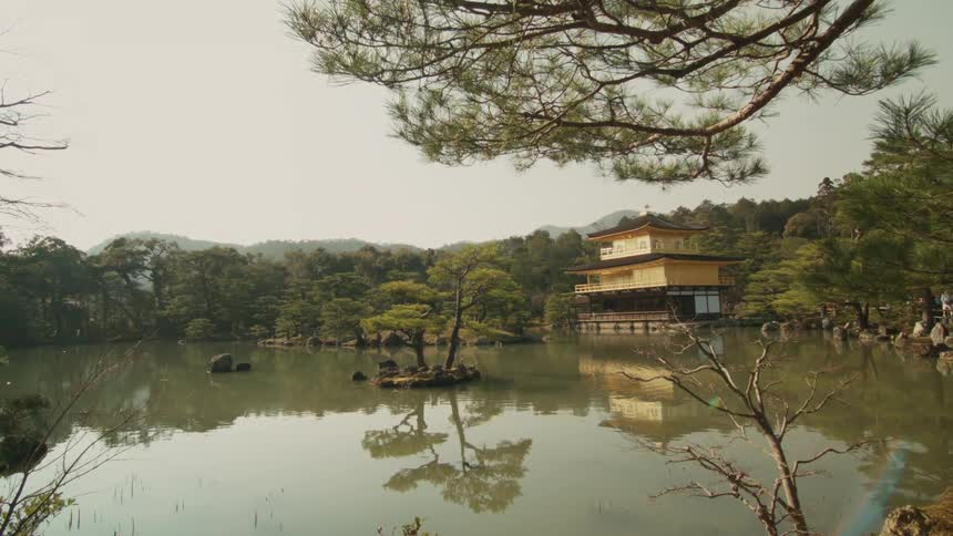 A house sits on a lake