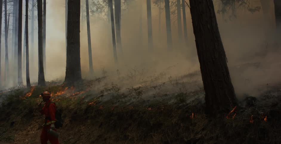 The fire and smoke travels down the hill