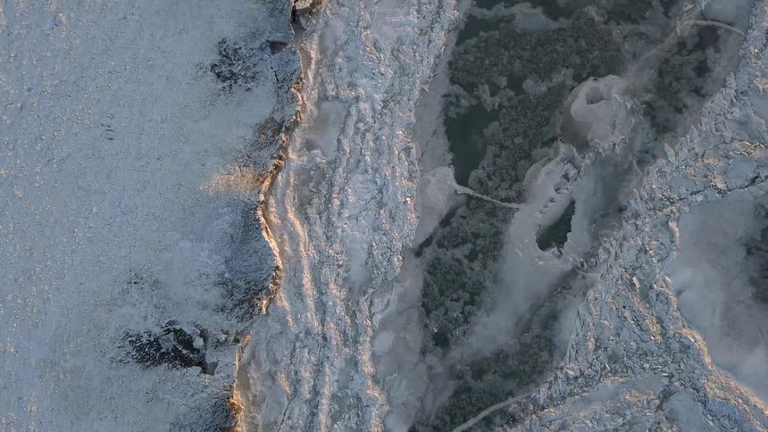 Passing over ice and snow covered terrain