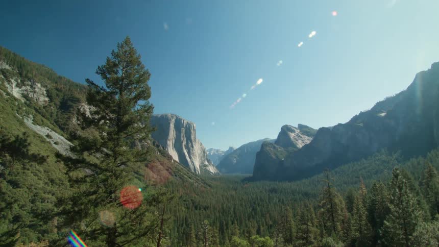 The sun is shining over the mountain range
