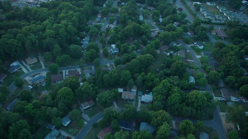 Houses sit in a neighborhood