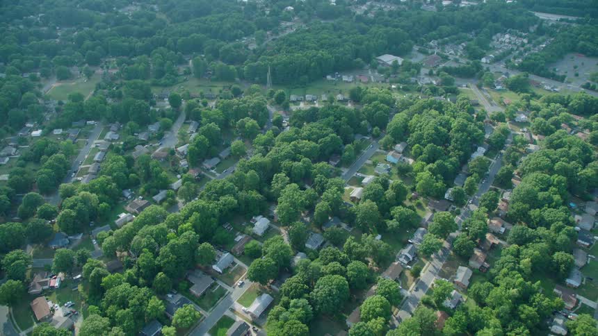 Houses sit in a neighborhood