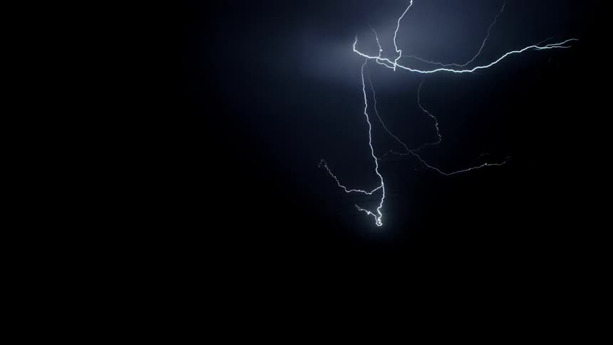 Lightning streaks and flashes in the night sky