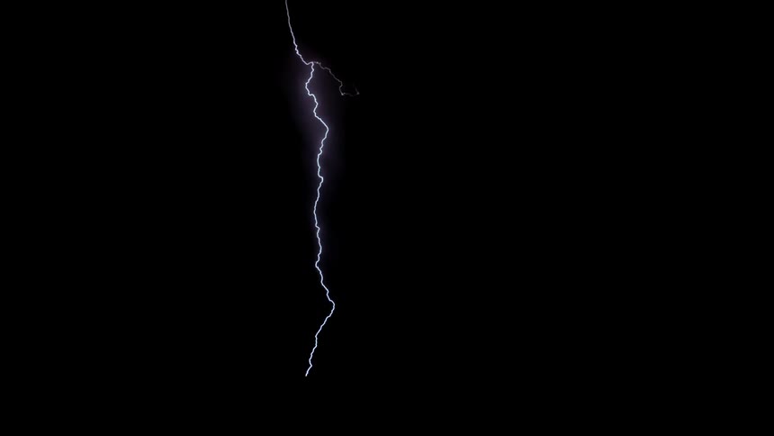 Lightning flashes in the night sky