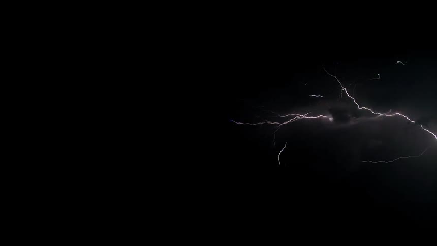 Flashes of lightning in a black sky