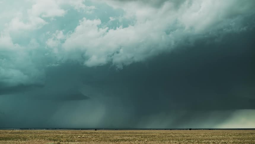 A thunderstorm is filmed from a distance