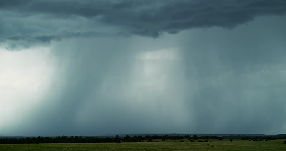 Rain and lightning over a field
