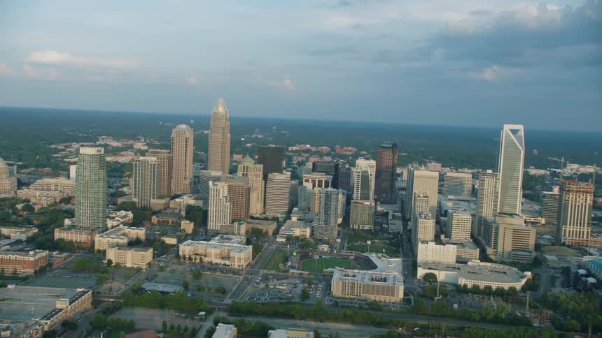 Clouds are hanging over a city in daylight