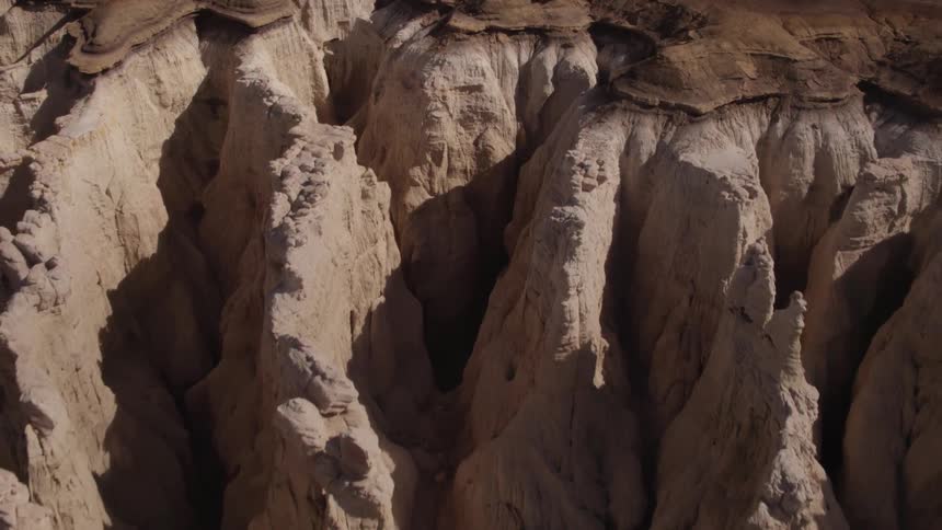 Rock formations cover a desert landscape