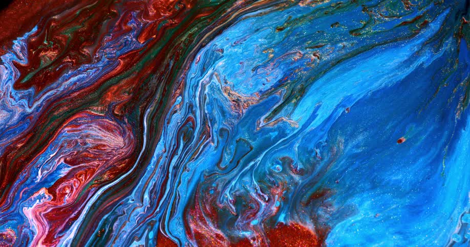 Colorful paint swirls and flows