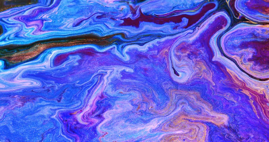 Colorful paint swirls and flows