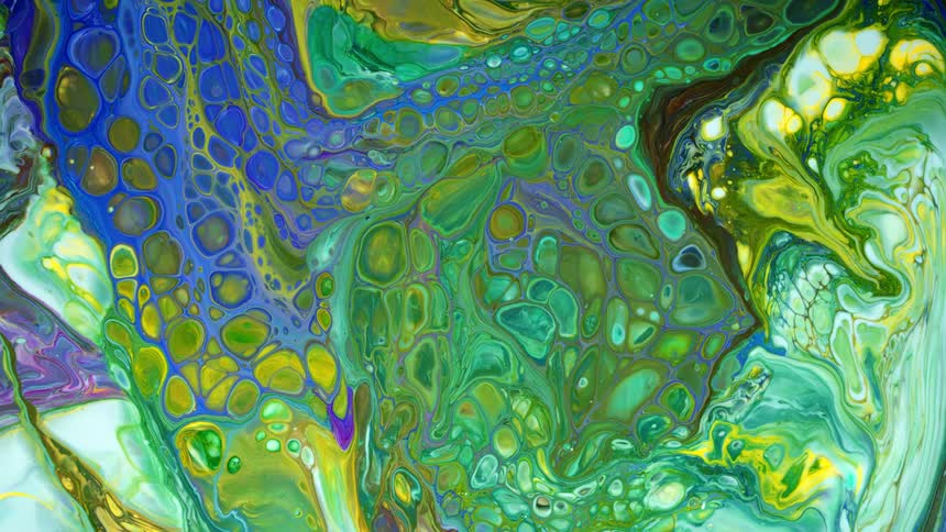 Colorful paint swirls and flows