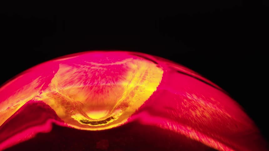 Color and light are fluorescing on a convex surface
