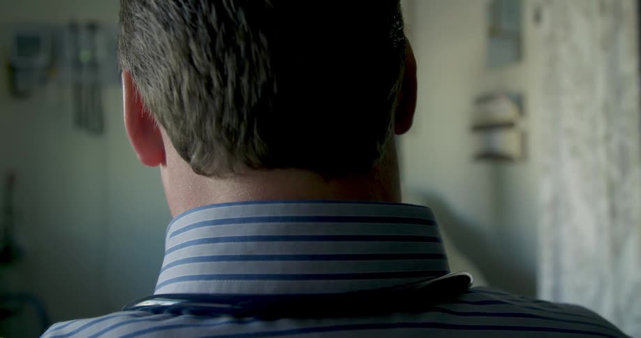 A doctor is facing a patient talking