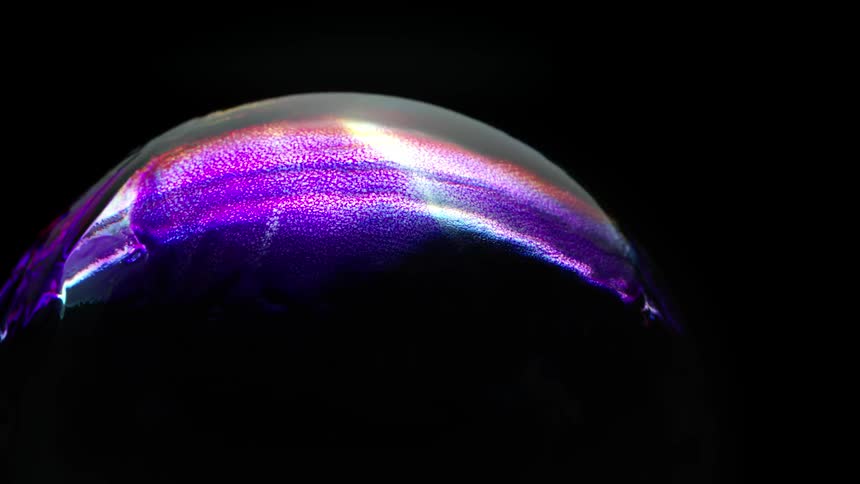 A globe has purple light flashing all over