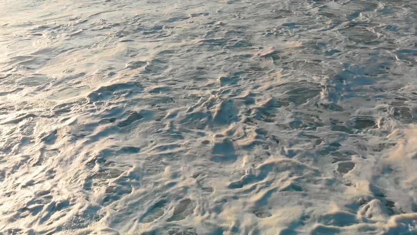 Ocean water ebbs and flows