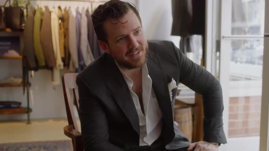 A man is talking inside of a store