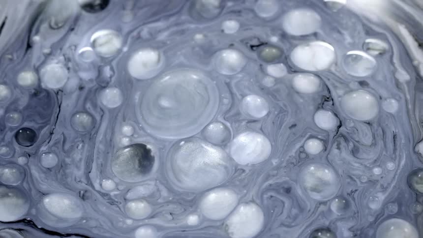 The bubbles and ink spin in a circle