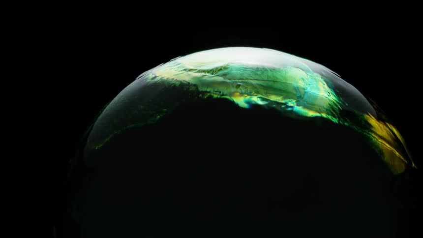 Light shines on a colorful sphere