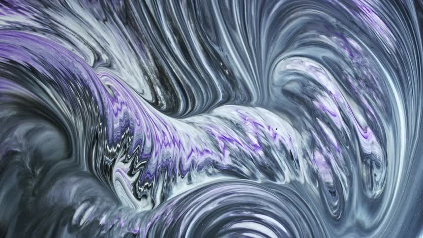 Acrylic paint swirls and flows