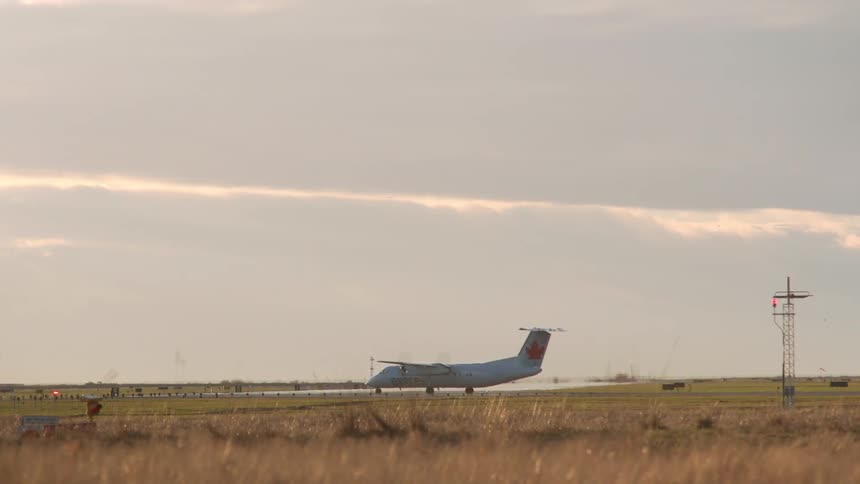 Airplane takes off on flat plains