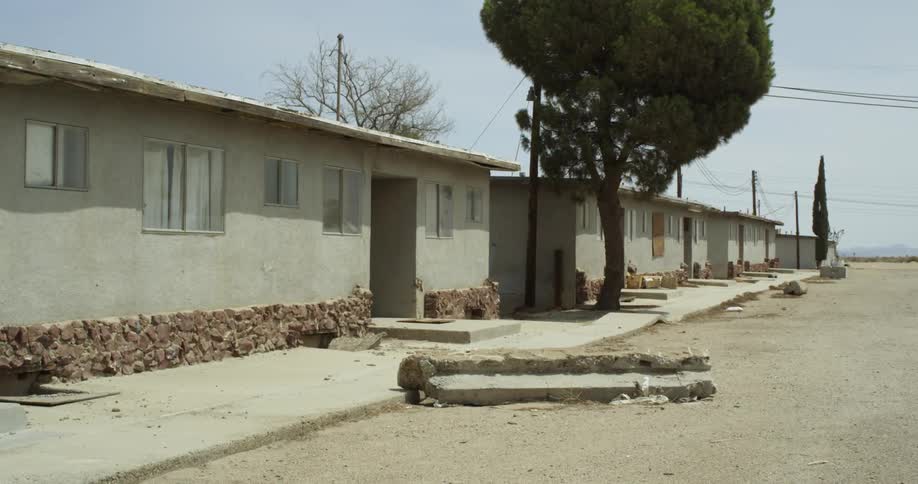 The lot in front of the homes is empty
