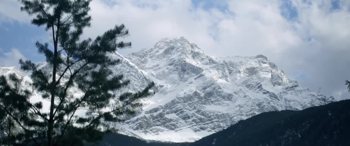 A large mountain is looming in the distance