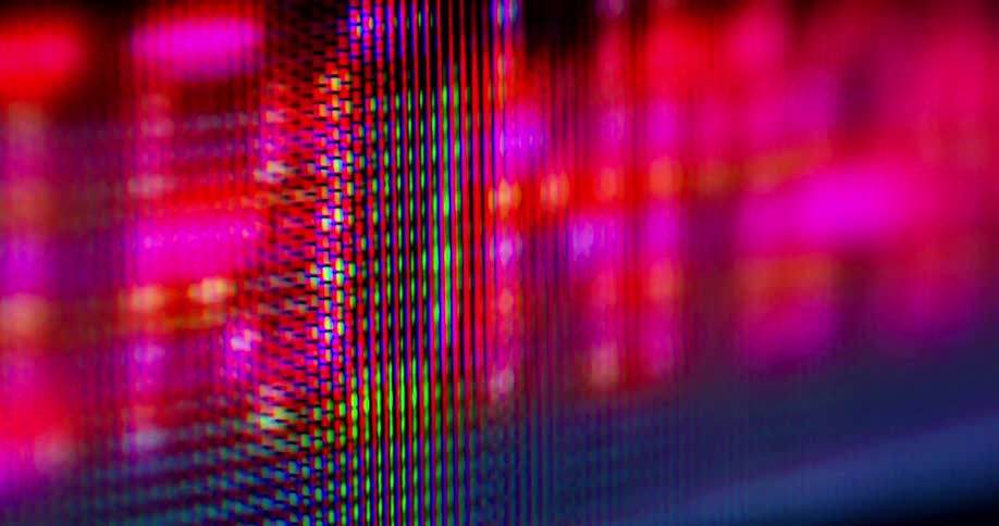 The monitor is flashing a name in red