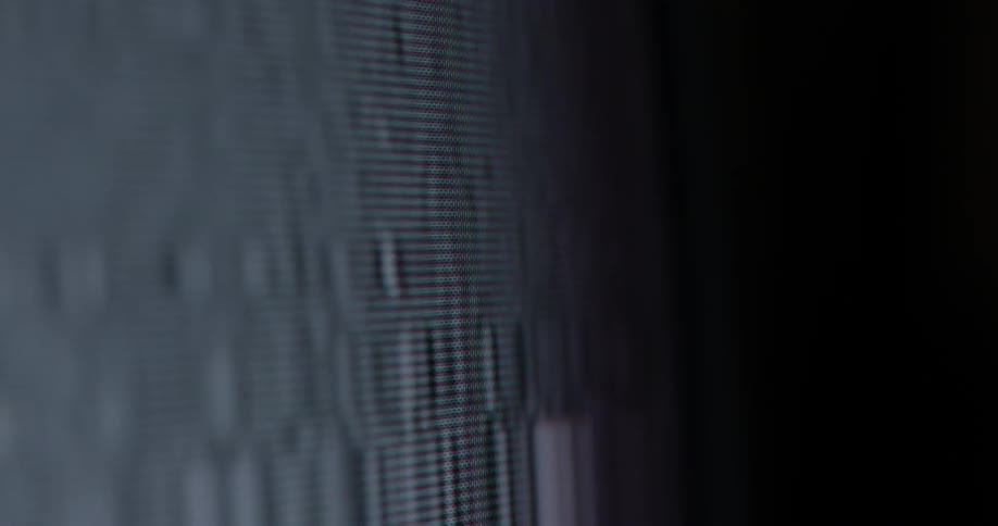 Lines of static and artifacts are spinning on a television screen