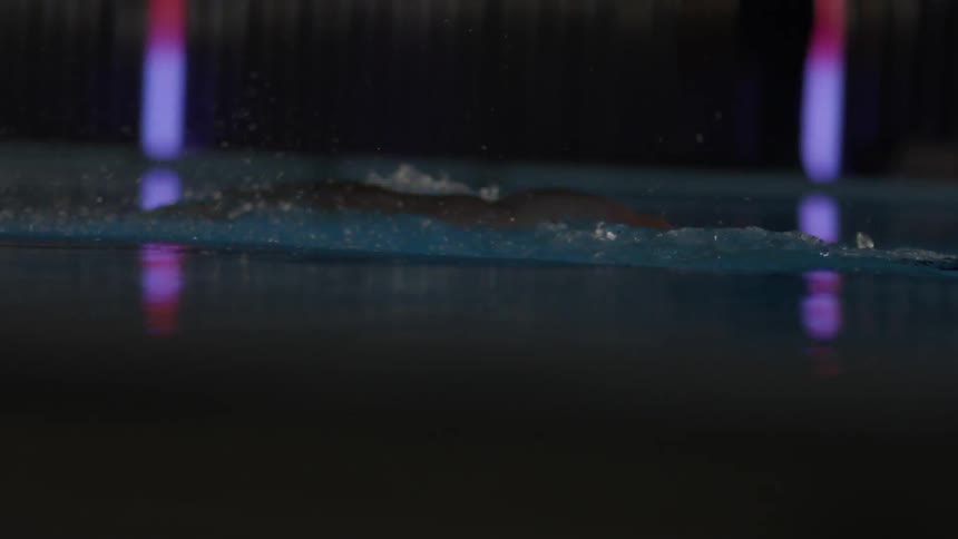 A person is swimming in the pool