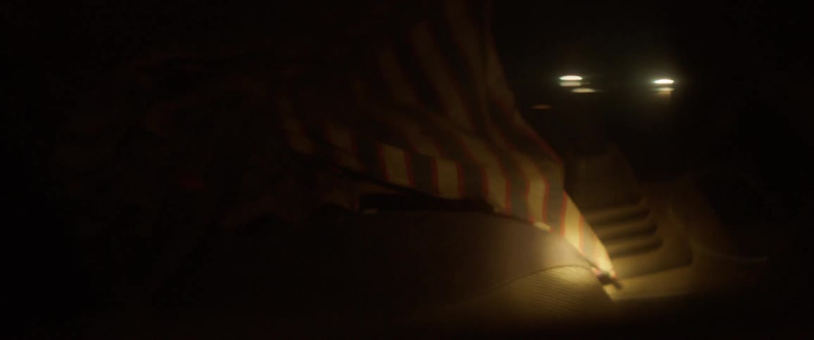 A flashlight is shined on the inside of a car
