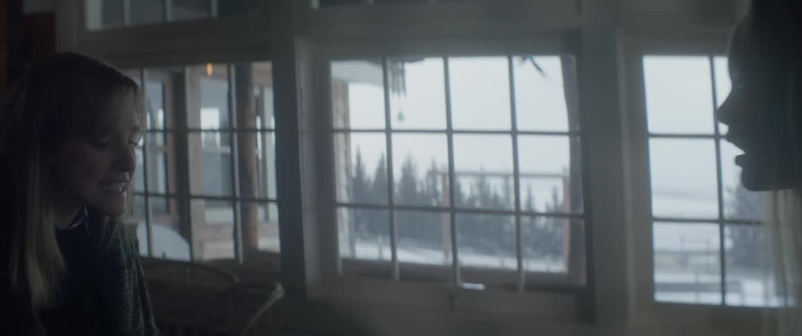 Two women arguing with each other indoors